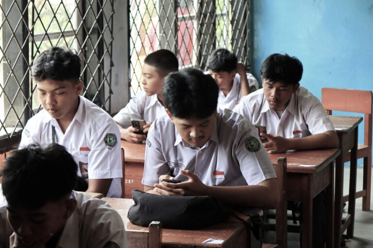 Students in a classroom showing consistent homework routines that make homework completion easier with Constructive Homework Routines.