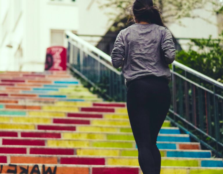 Intimacy Problems In Menopause illustrated by a woman exercising outdoors, showing lifestyle’s role in sexual health support.