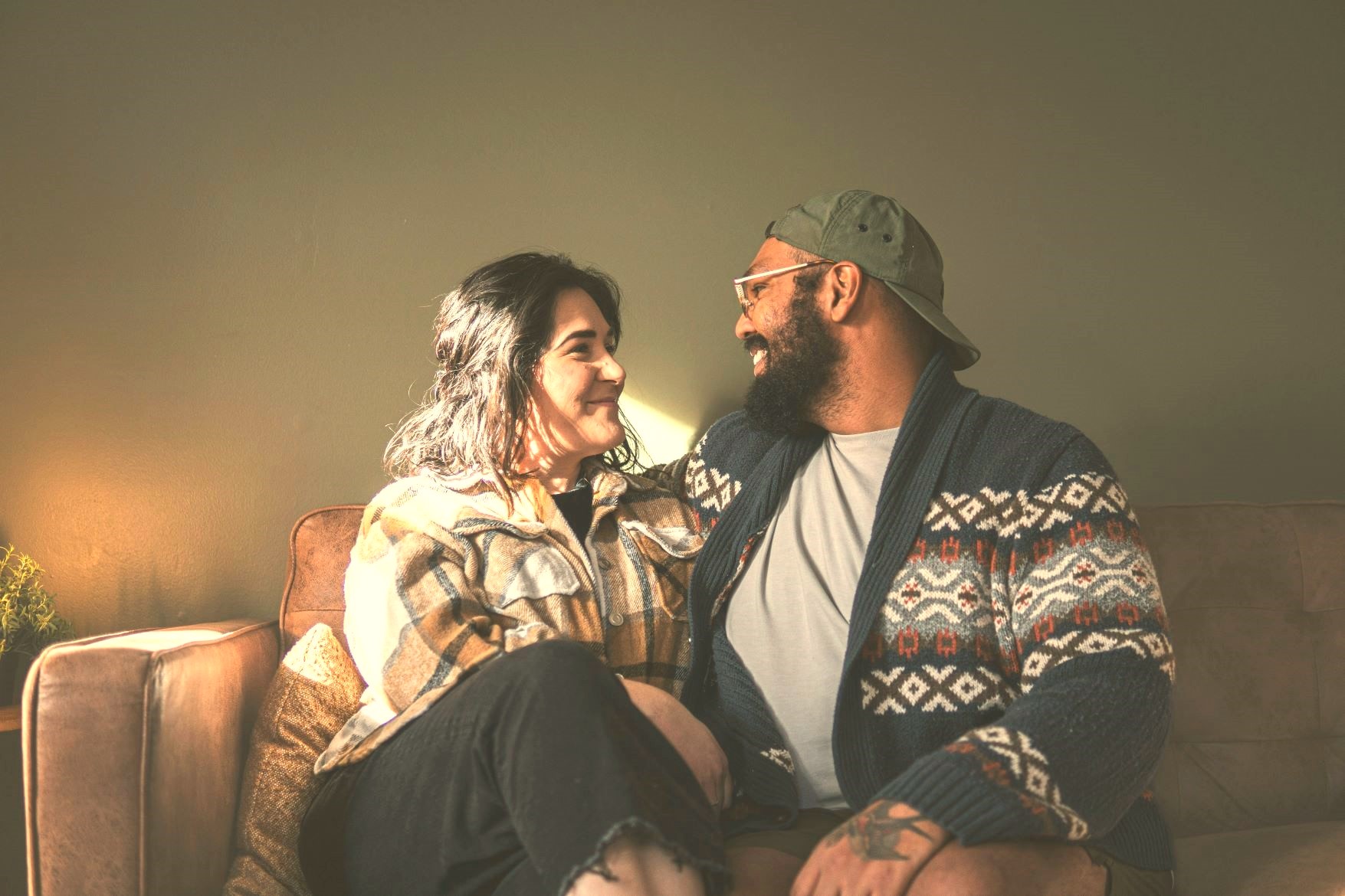 Couple discussing intimacy, as people often think situations like premature ejaculation relate to erectile dysfunction, yet Arousal Issues explain why they aren't related in real life.