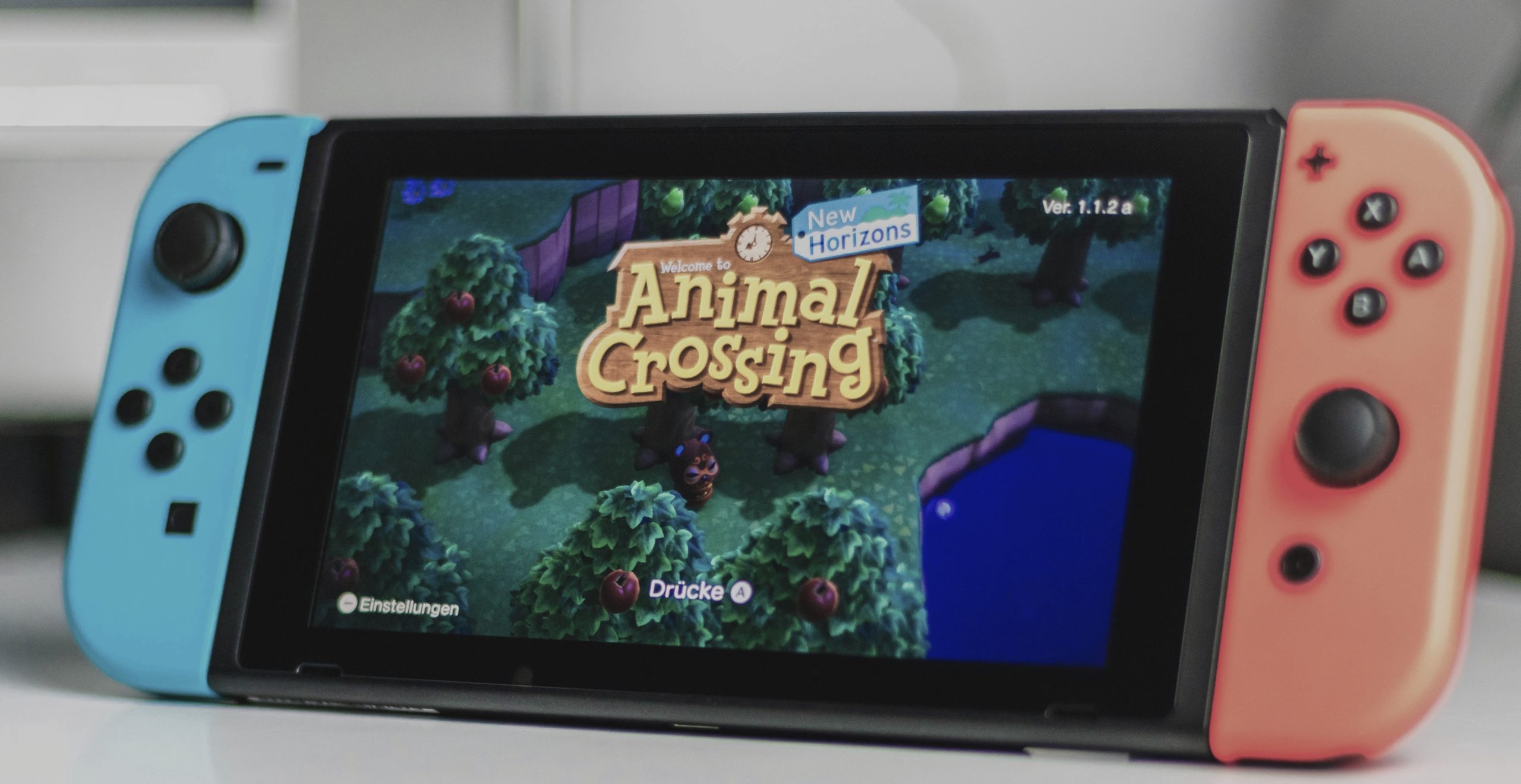 Nintendo Switch with Animal Crossing game, showing playful entertainment as healthy Boredom Solutions.