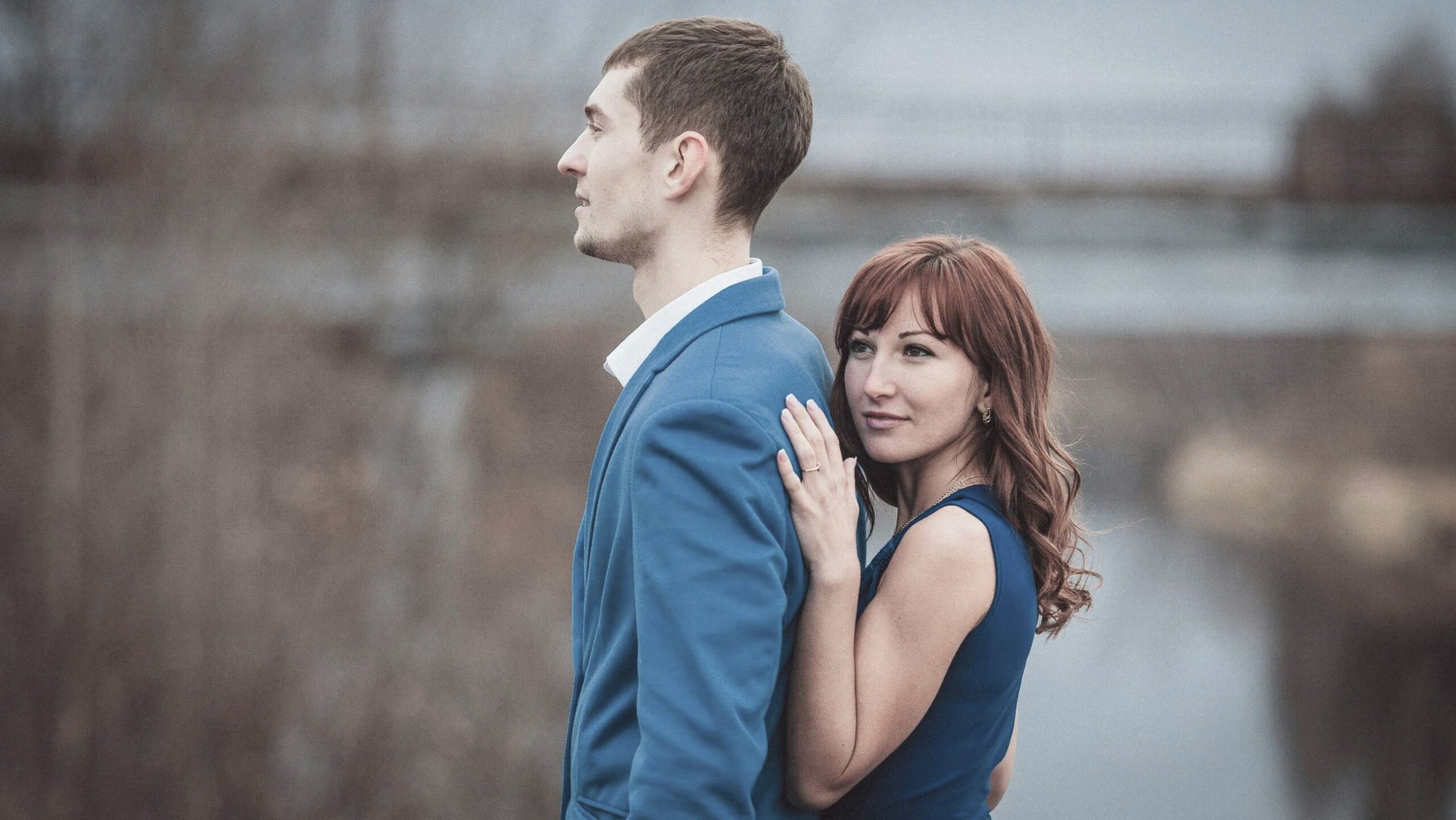 A couple embracing through emotional ups and downs within the circle of life, while Weathering Relationship Difficulties