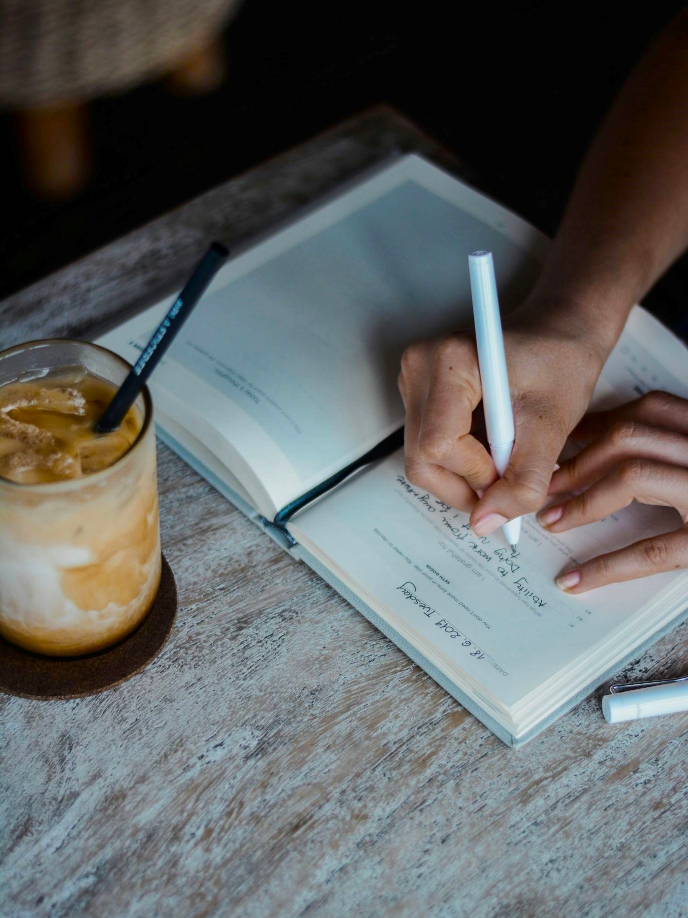 A girl journaling about self-worth and being her best friend, calmly embracing Authentic Acceptance.