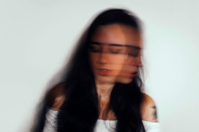 Blurred portrait showing social anxiety and inner confusion, reflecting need for guidance and support via the Existential Experience.
