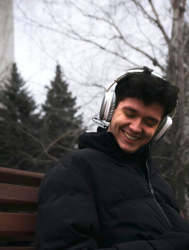 Man listening to music benefiting mental health, despite some opinions because Music Improves Emotional Balance naturally.