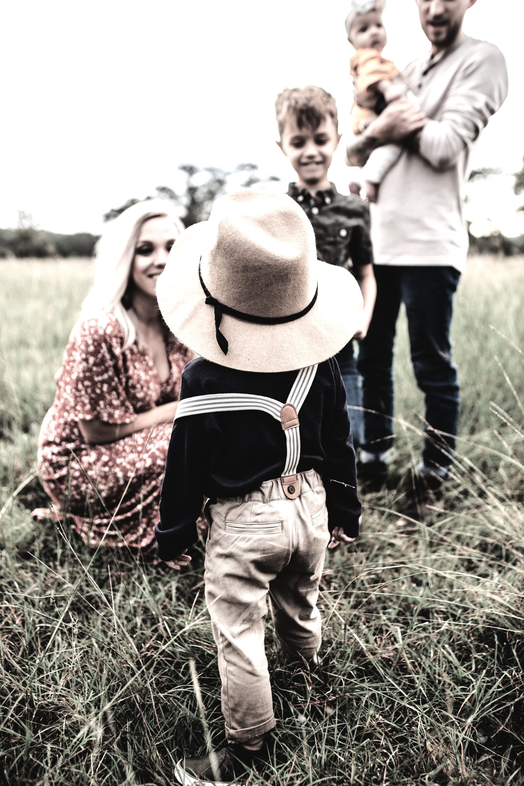 Family sharing warm outdoor time shows care and bonds from family attachment.