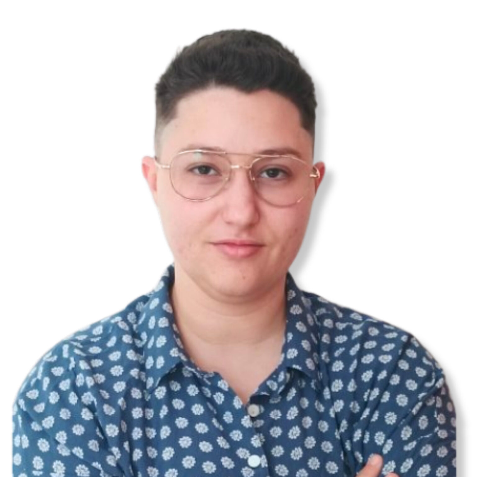 Calm young man with glasses and patterned shirt, promoting mental health awareness and self-care.