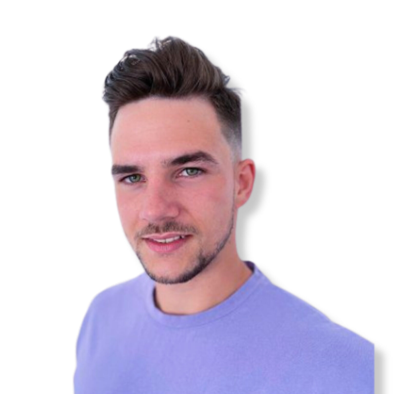 Relaxed young man with styled hair and a calm expression, wearing a purple shirt, on a plain white background.