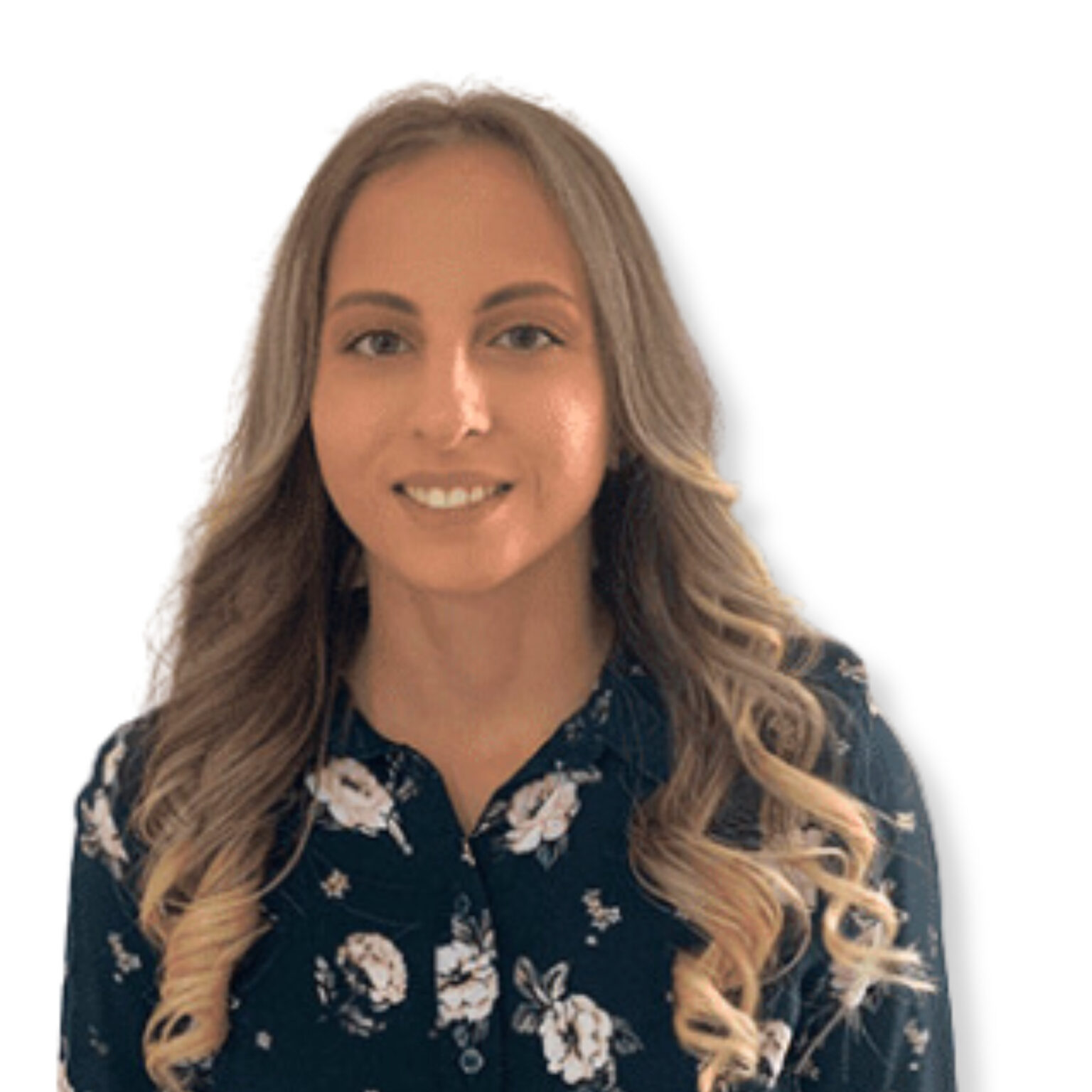 Supportive mental health professional with a calm demeanor, wearing a floral blouse, symbolising compassionate and empathetic psychological care.