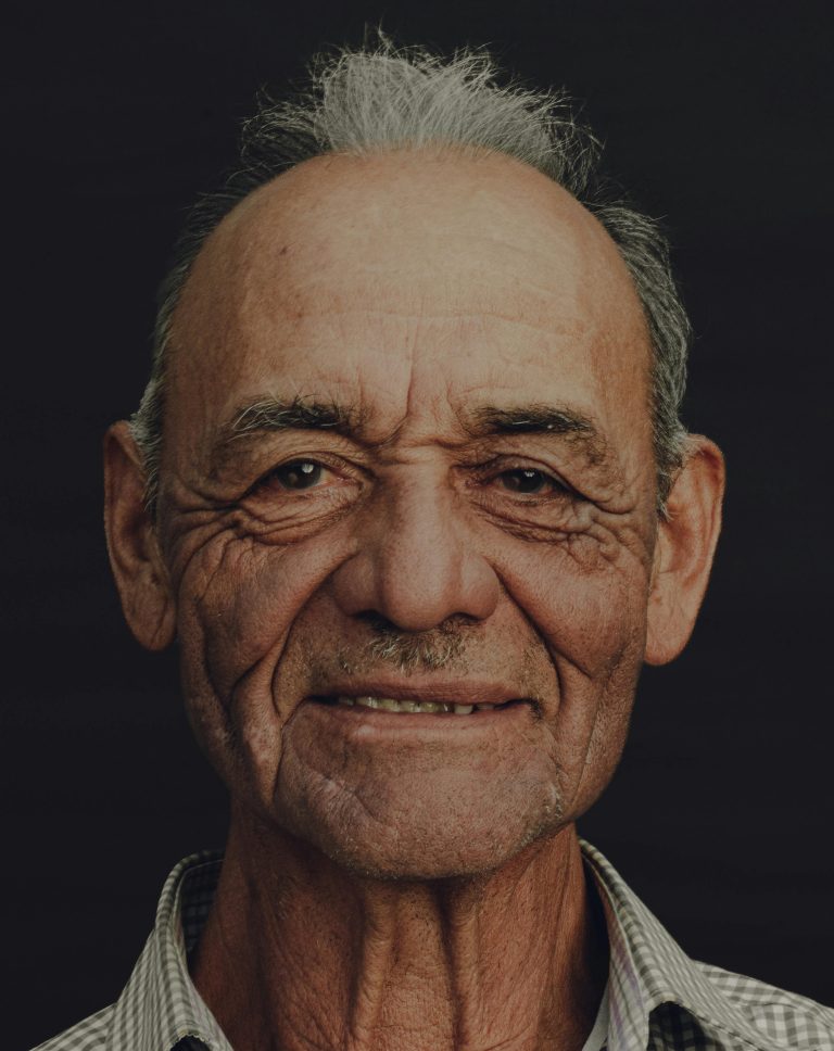Here's an older man feeling happy because, despite being an older man, he has many acquaintance relationships.