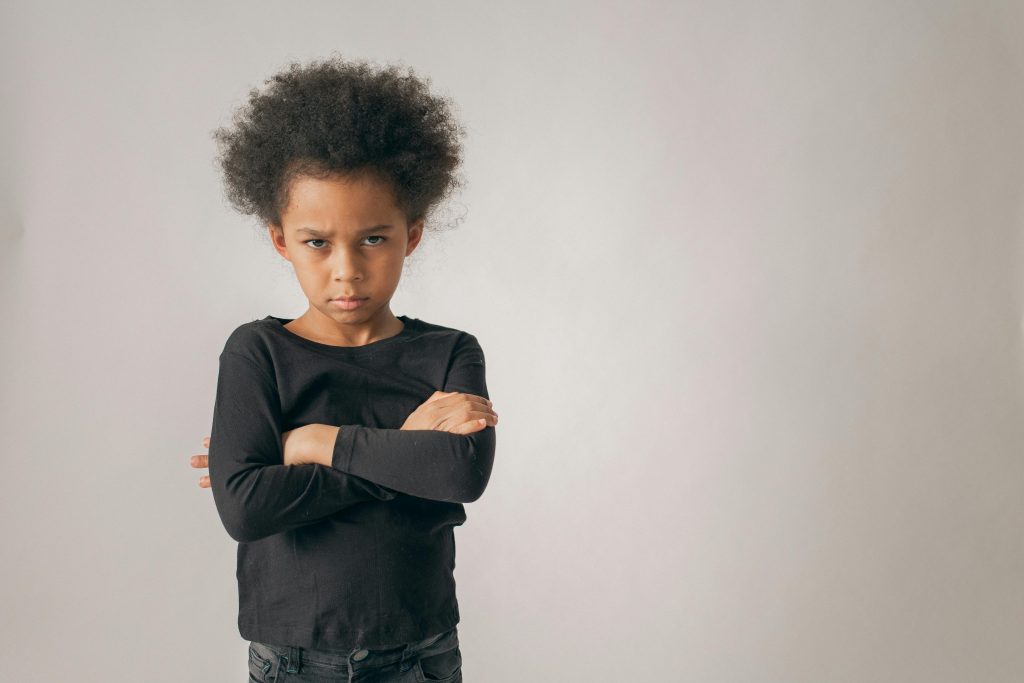 A young girl is angry, possibly the result of her parents saying something to her that literally sets her off. There's a huge list of things you should (and should not) say to your angry child.