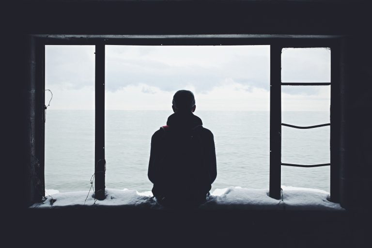 How can therapy help manage dissociative symptoms? 