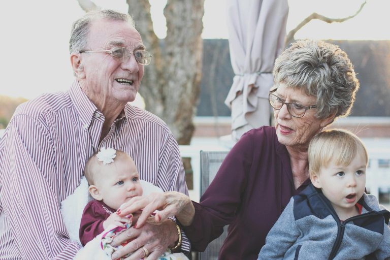 Grandparents bonding with grandchildren—mental health benefits shown.