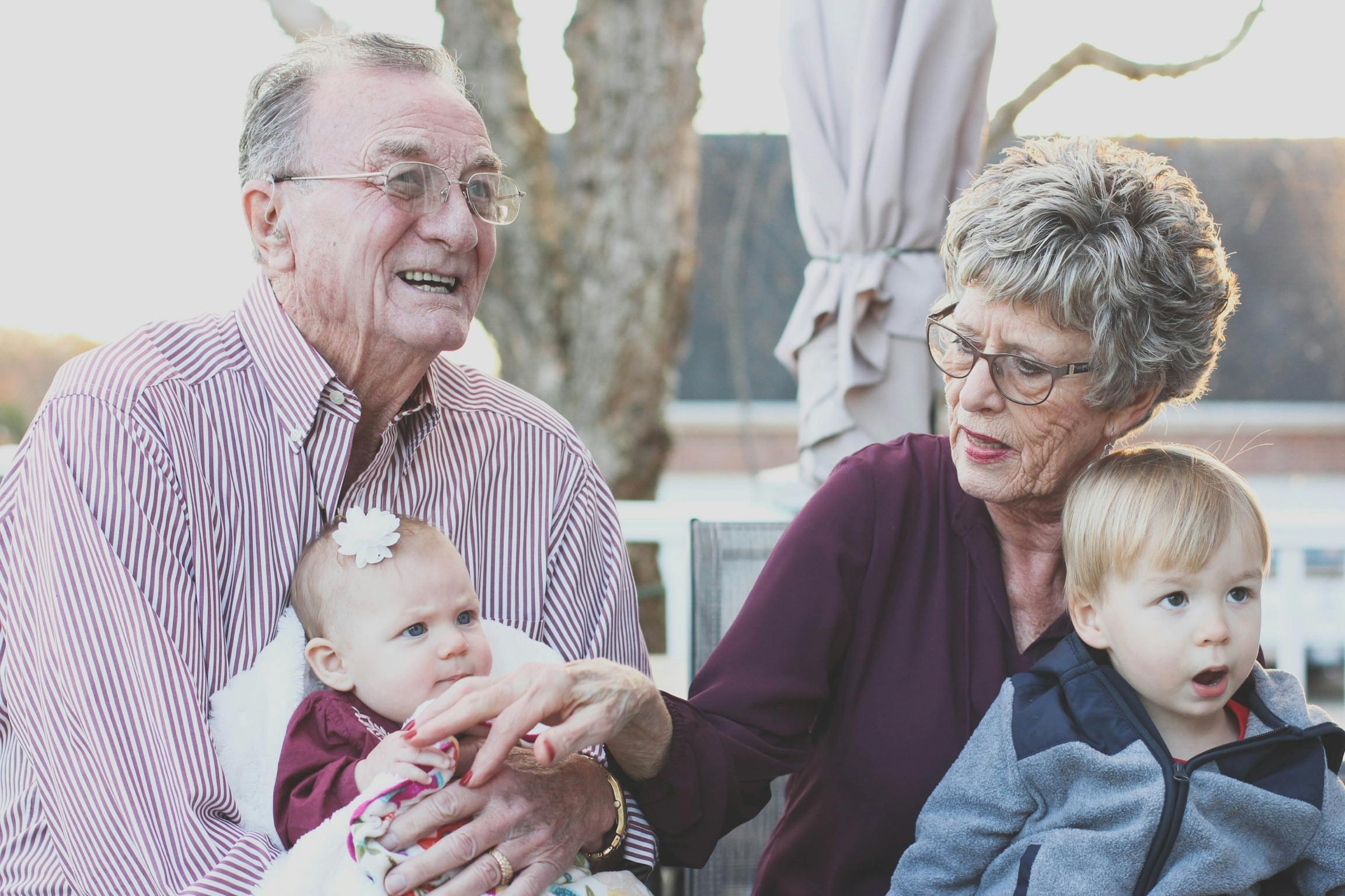 Grandparents bonding with grandchildren—mental health benefits shown.