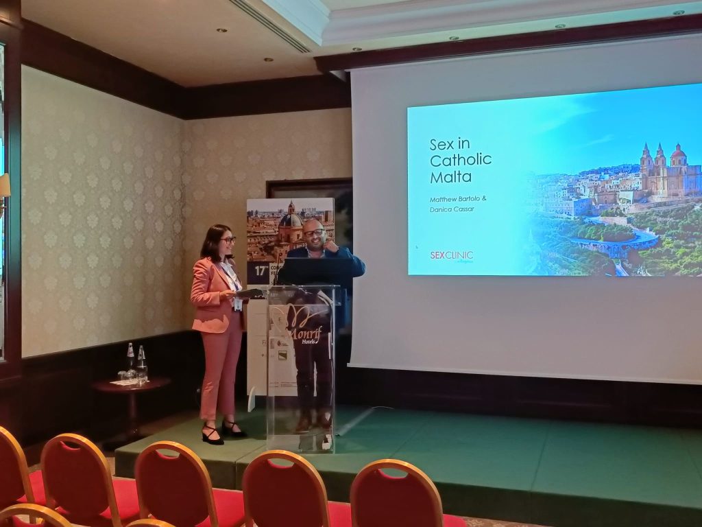 Matthew Bartolo and Danica Cassar presenting the study ‘A Maltese Perspective of Sex: a Maltese cross-sectional study’ at the 17th Congress of the European Federation of Sexology in Bologna, standing at a podium with a presentation slide behind them.