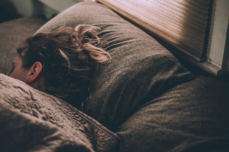 Person sleeping, representing research on sleep quality interventions for fibromyalgia, conducted by Willingness.