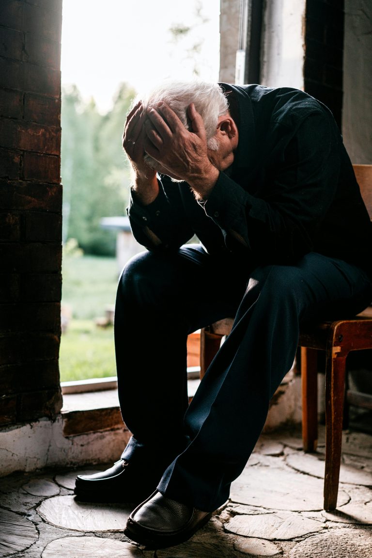 Elder independence portrayed through a thoughtful moment of a grandparent, showing emotion, ageing, and human care.