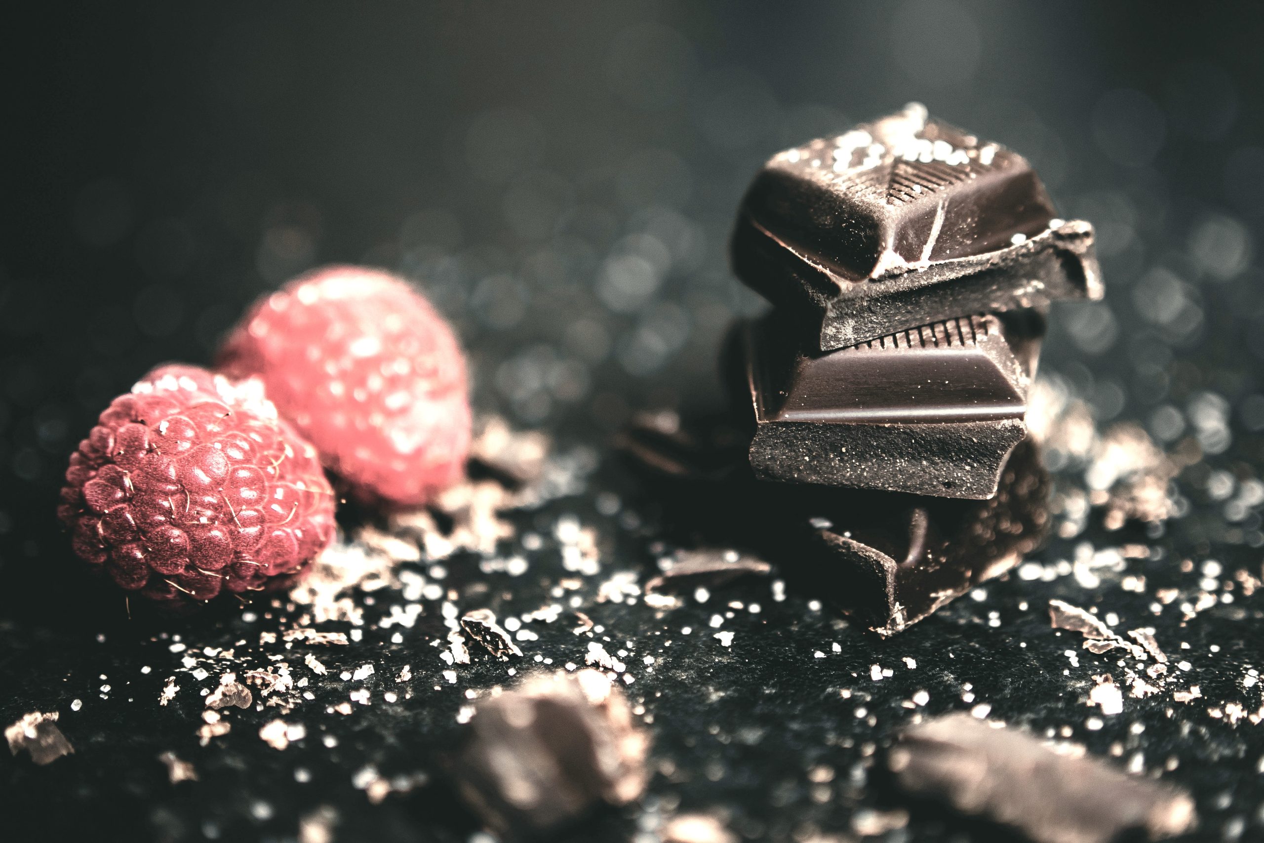 Antioxidant power shown in dark chocolate and berries, supporting focus and improved quality of life naturally.