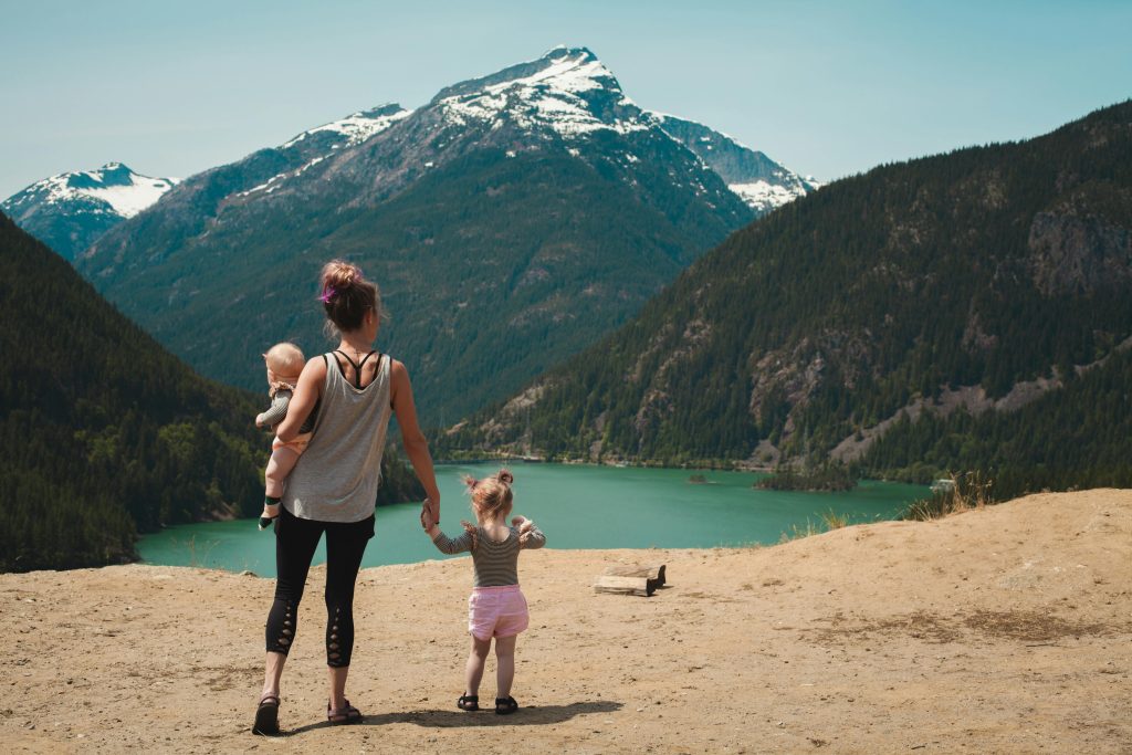 Parent-child connection shown in nature, reflecting Willingness values of support, emotional presence, and shared calm.