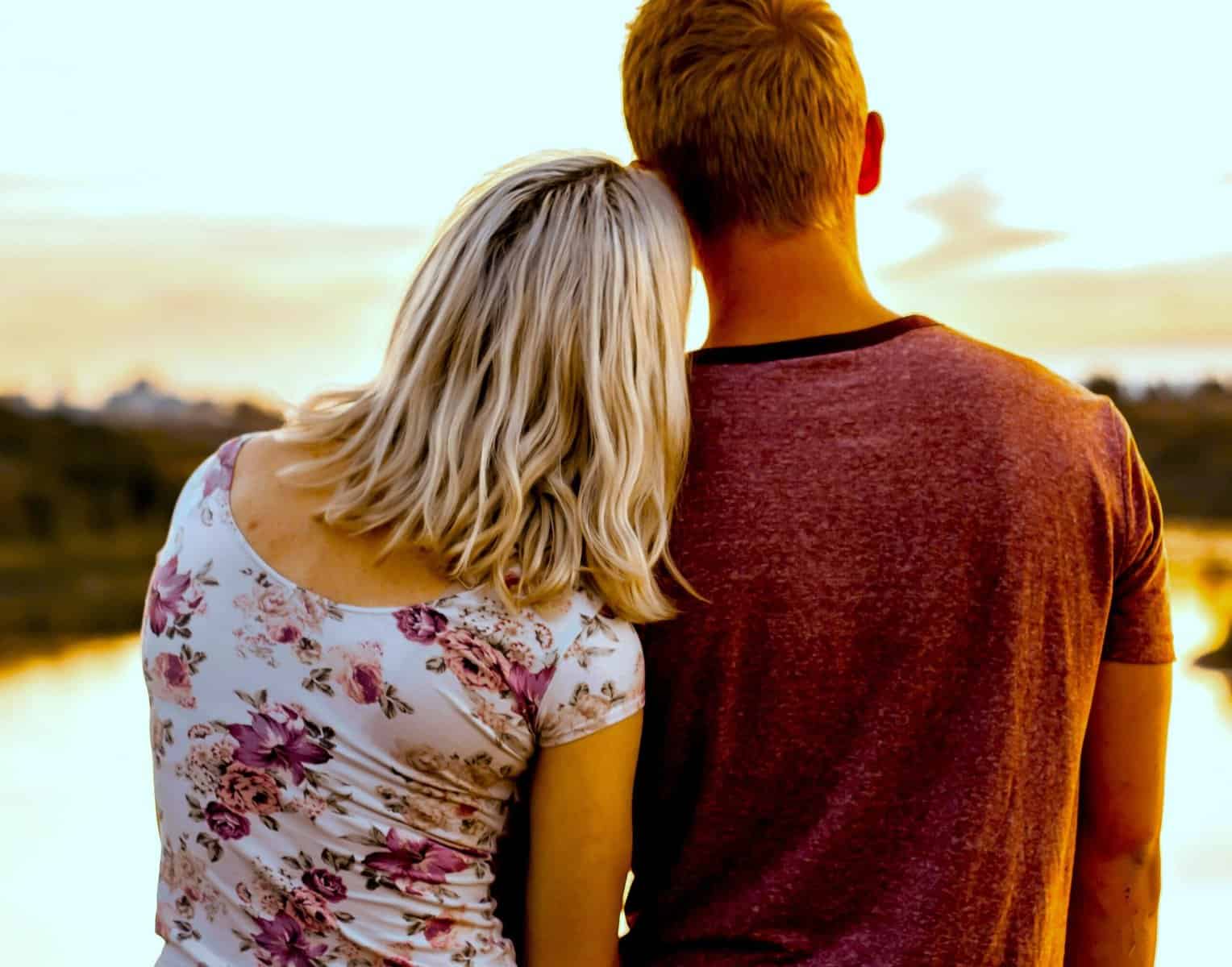 Valuing Health Together shown by couple at sunset, symbolising emotional closeness and shared wellness goals.