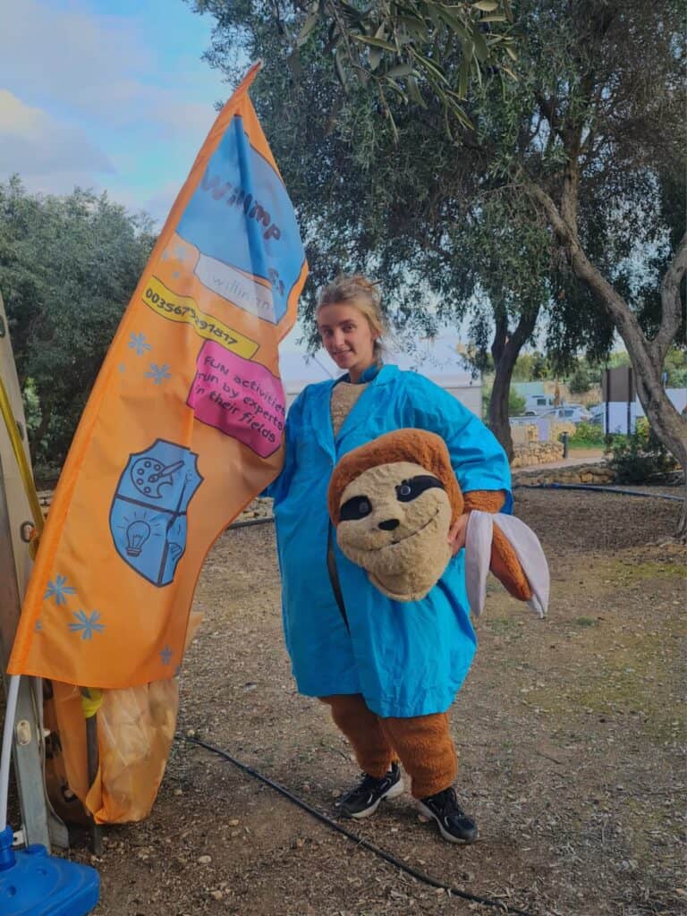 Ugne Blaskyte in costume at a Willingness camp event during her Malta-based Clinical Psychology Gap Year.