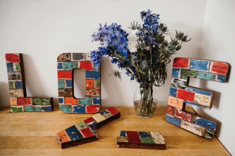 LOVE letters and flowers symbolise growth following a recent breakup and Single Life Empowerment.