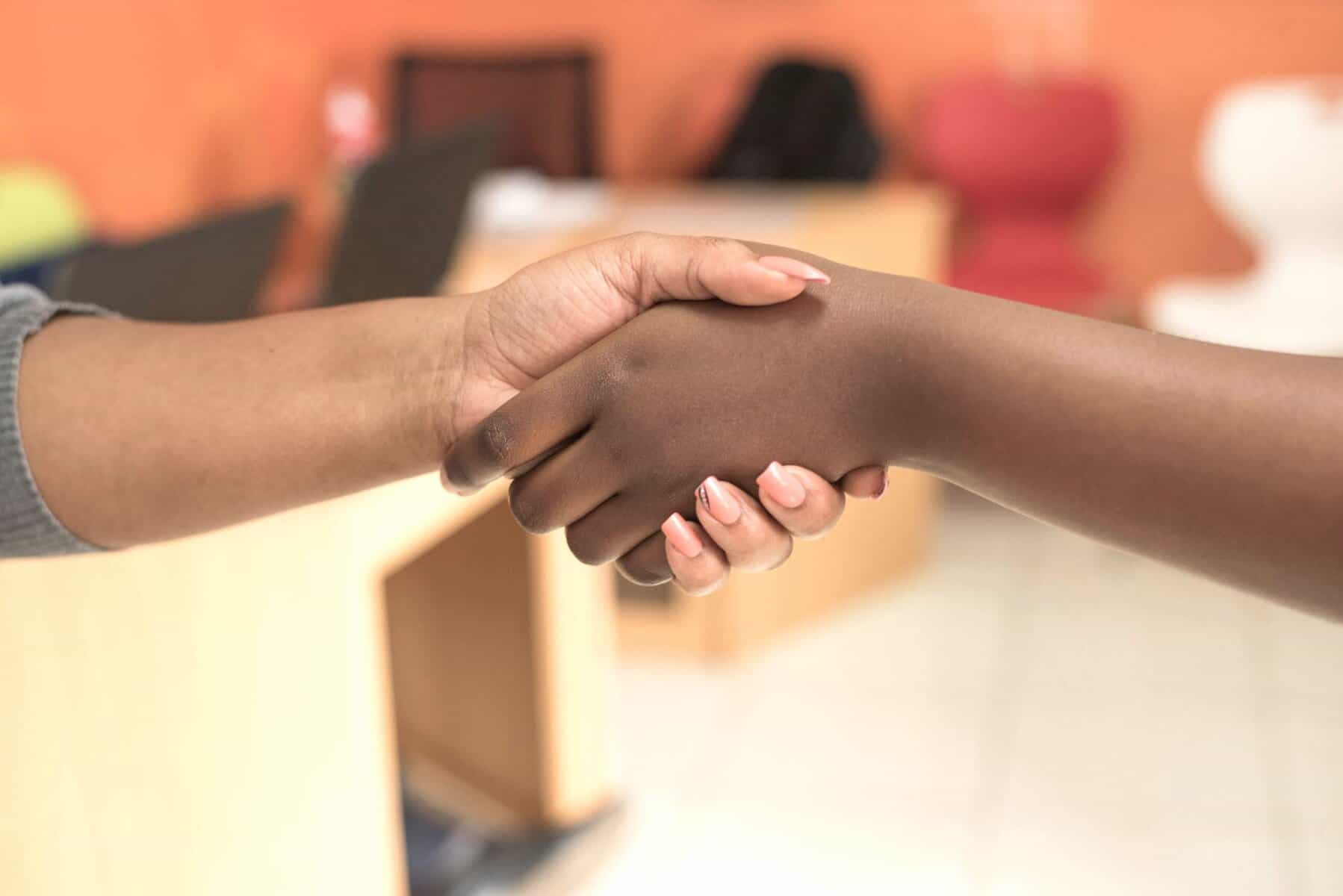 Two people aligning equally in discussion, showing Values Prioritization for a happy relationship outcome.