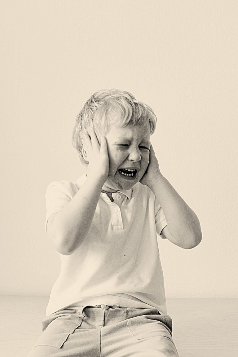 Distressed child during festive abuse reflecting lifelong trauma and need for Abuse Awareness Campaigns.