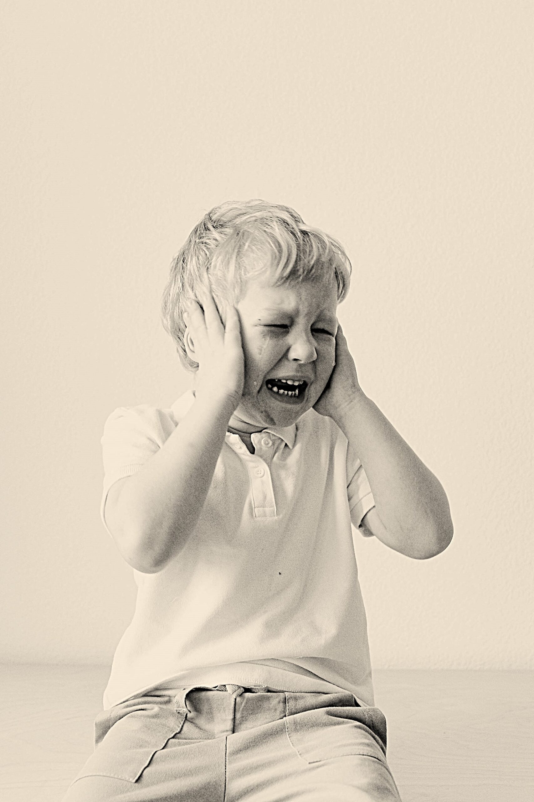 Distressed child during festive abuse reflecting lifelong trauma and need for Abuse Awareness Campaigns.