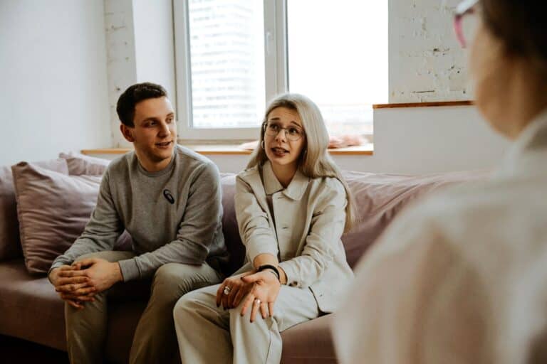 Couple attending couples therapy session showing support when therapy seems far-fetched but Couples Therapy Life Transitions are actually inevitable.