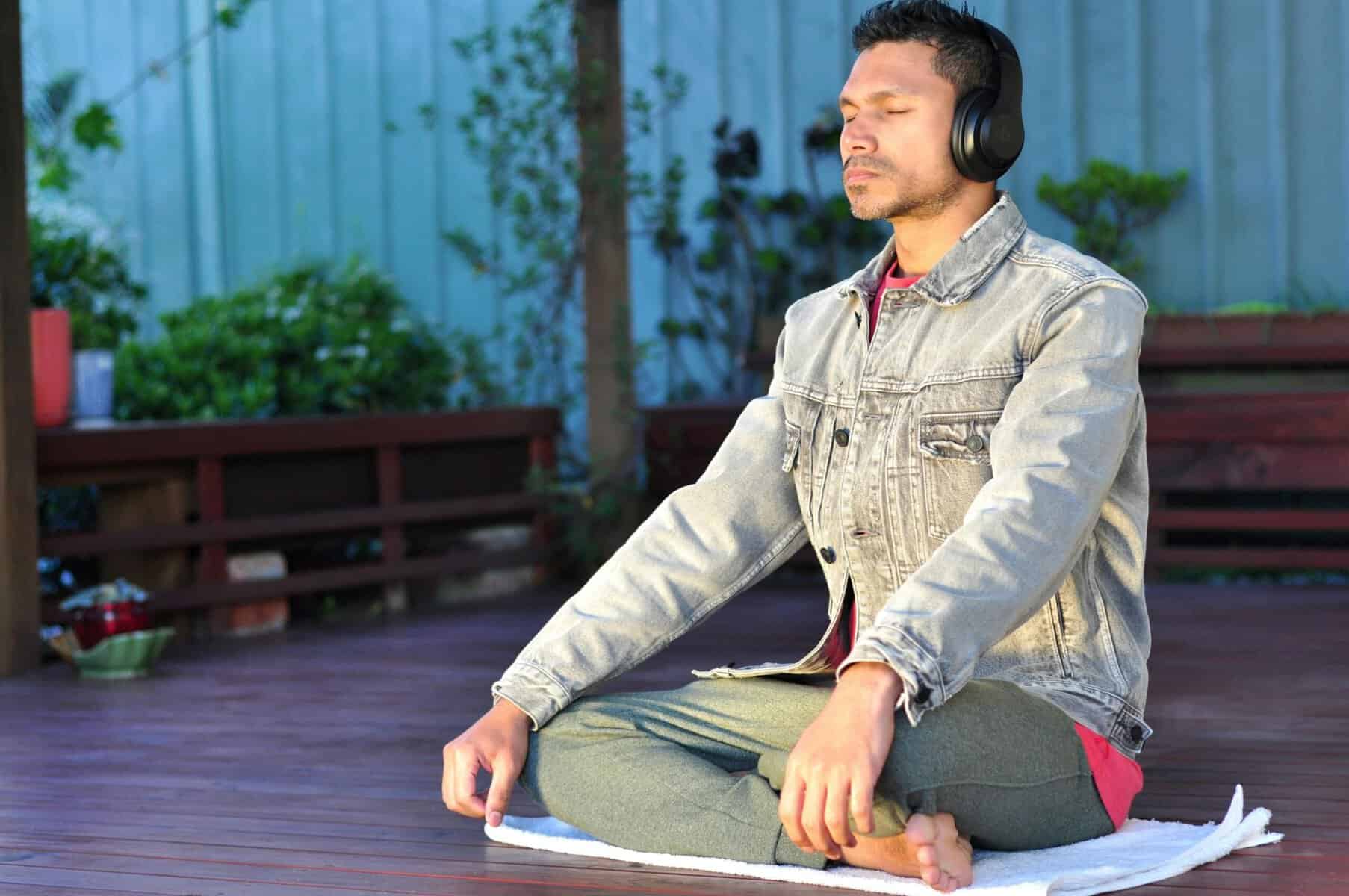 Man practising mindful breathing outdoors, showing real daily regulation beyond common misinterpretations through Emotional Monitoring.