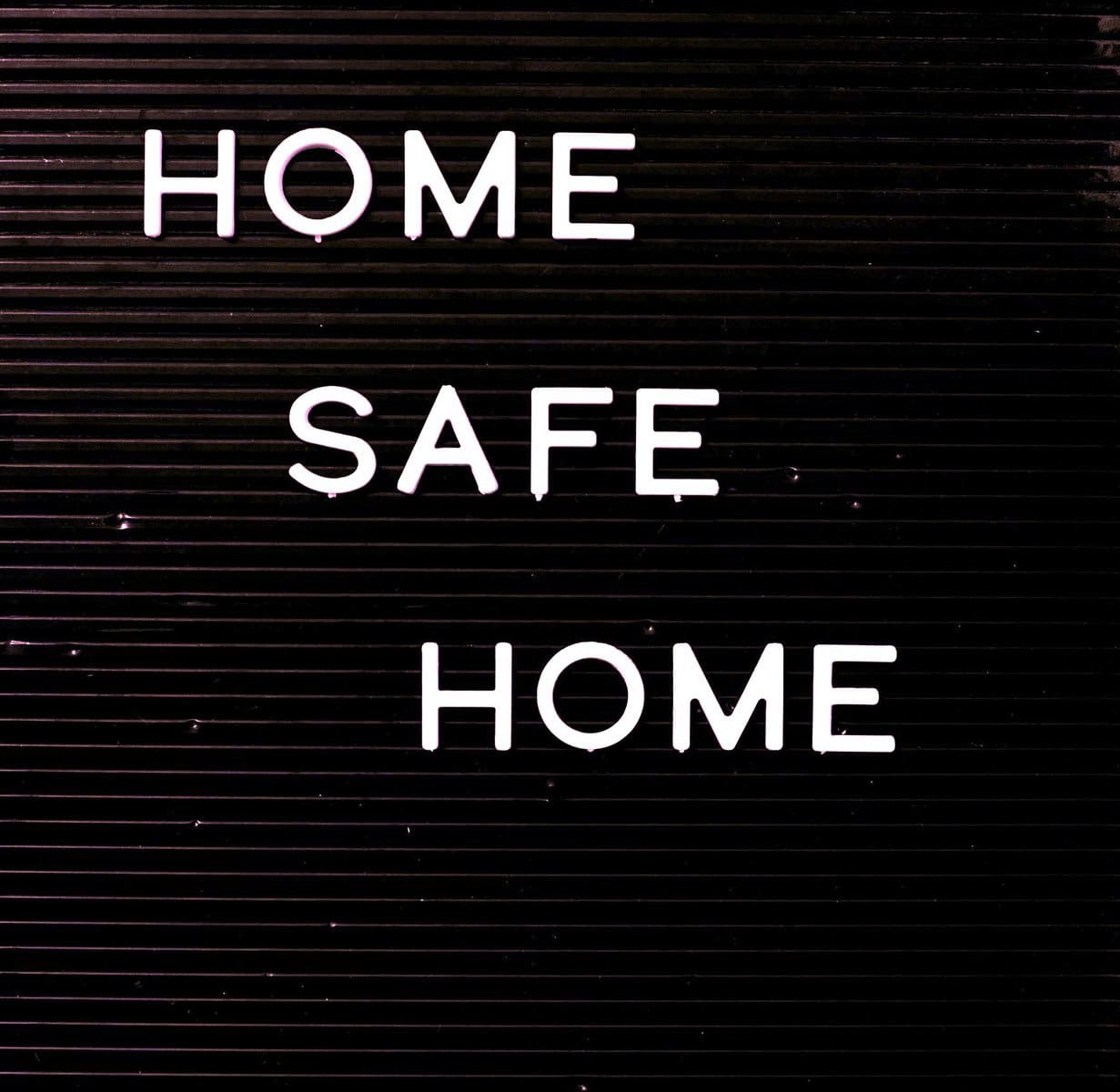 Home safe home sign, reflecting emotionally safe homes across life, not only childhood, showing support and care of Relationship Security.