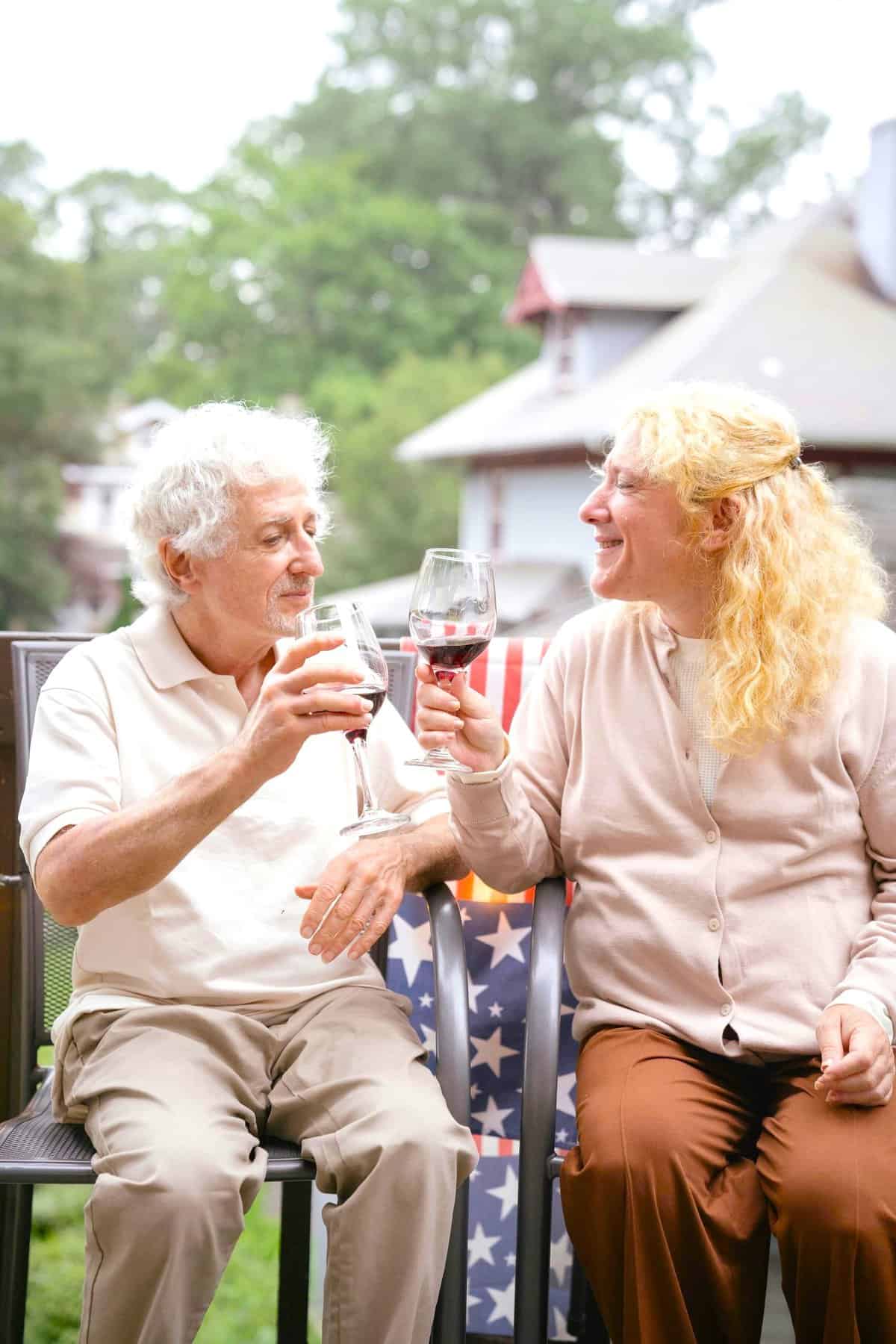 Older couple sharing relaxed outdoor moment, reflecting routine, connection, and well-being during ageing transitions with Later Life Adjustment Support.