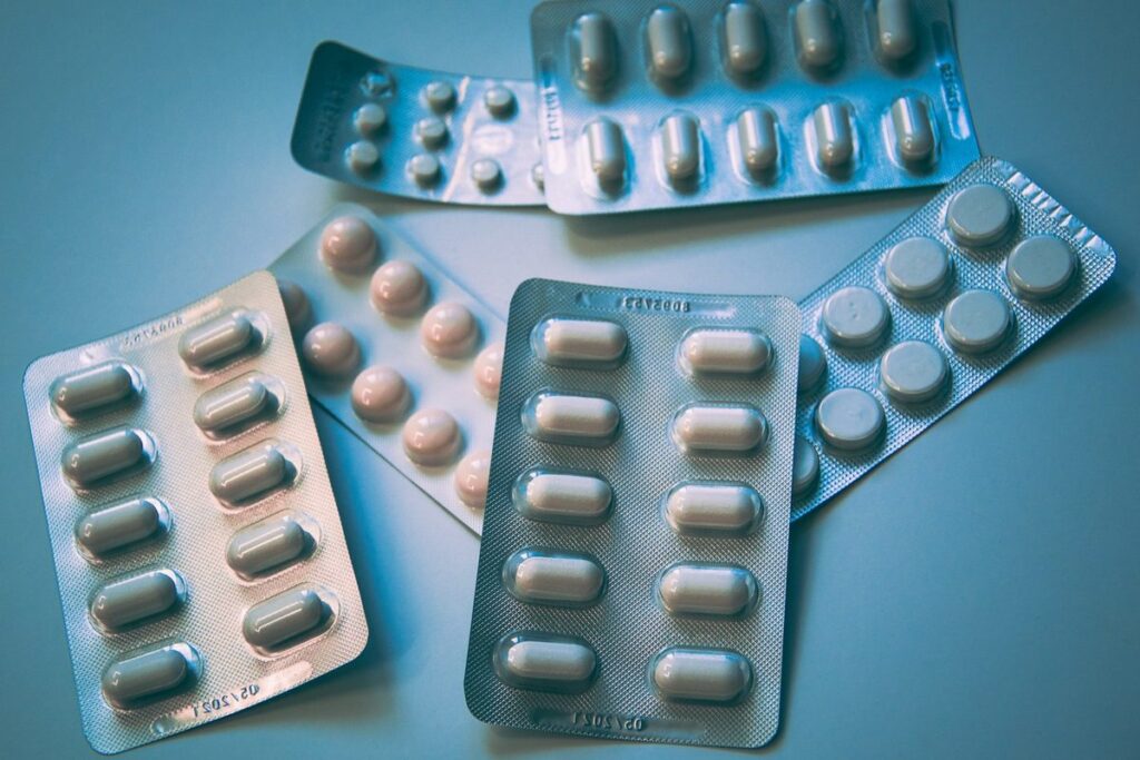White and blue medication blister pack